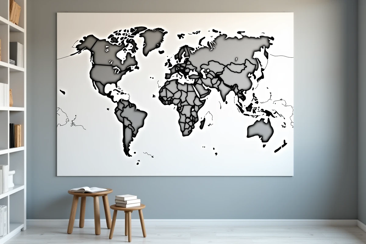 Grande carte du monde vierge affichée sur un mur gris dans une salle d'étude minimaliste avec des livres de géographie